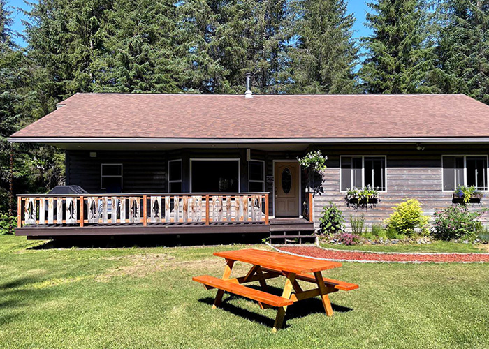 Located on five private, forested acres just minutes from downtown Seward, Gray Light Lodge is a spacious, three-bedroom retreat that comfortably sleeps six.